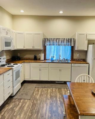 Modern Farmhouse 3 Bed, 2 Bath Apartment, Sleeps 7, Lots of Space, Steps to Downtown, Honeywell & Eagles Theater