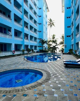 Cowrie Shell Beach Apartments Official