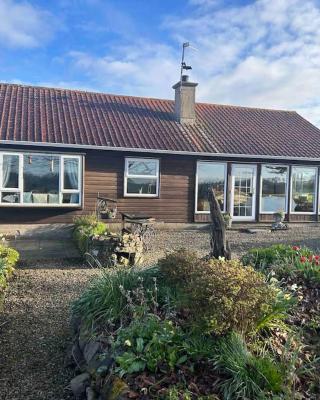 Wooden Cottage with lake view