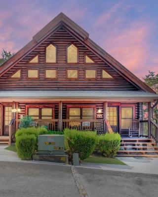 2 Miles from Dollywood Family Resort with Seasonal Outdoor Swimming Pool, Year around Heated Indoor Swimming Pool, Townhome Style Cabin, Private Hot Tub, Arcade, TV, Wifi, Kitchen with Refrigerator, Washer and Dryer
