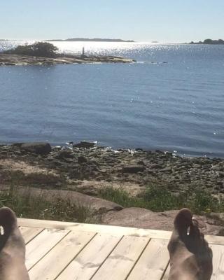 Cottage with own beach, seaterrace & pavillion.