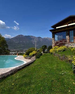 Villa in Pisogne with pool garden and lake view