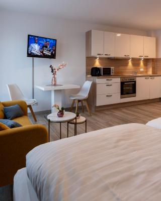 GLEUEL INN - digital hotel & serviced apartments & boardinghouse mit voll ausgestatteten Küchen