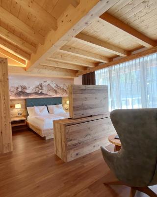 DOLOMITES B&B - Suites, Apartments and SPA