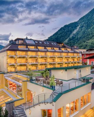 Hotel Norica - Thermenhotels Gastein mit dem Bademantel direkt in die Therme