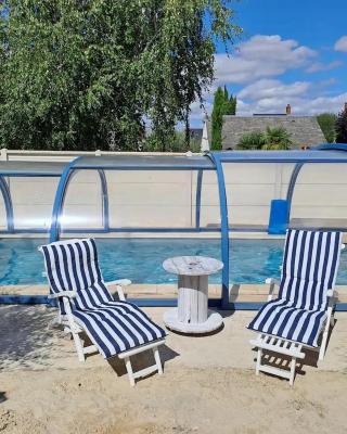 Chambre bleue avec accès plage