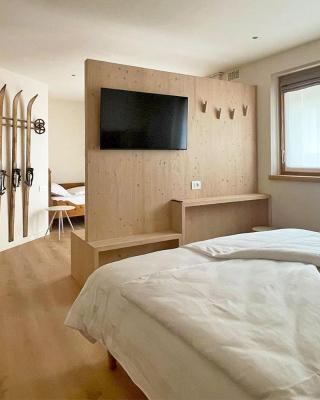 Alpine Rooms and Suites Livigno - Camana Noa -