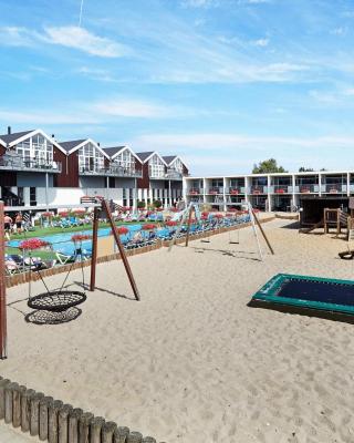 4 person holiday home on a holiday park in Glesborg