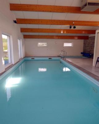 Quaint holiday home with heated indoor pool