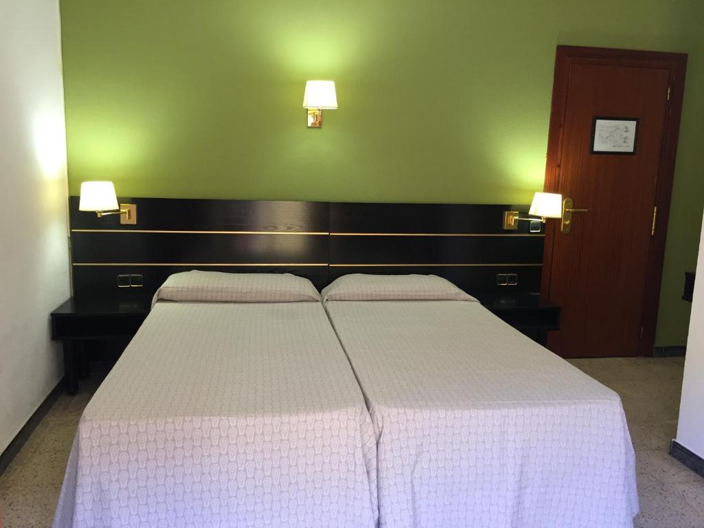 Hotel Proa Astor客房内的一张或多张床位