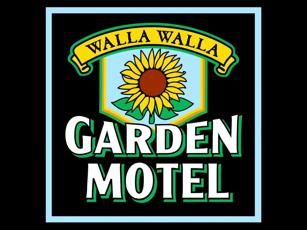 瓦拉瓦拉Walla Walla Garden Motel的花园汽车旅馆的标志,带向日葵