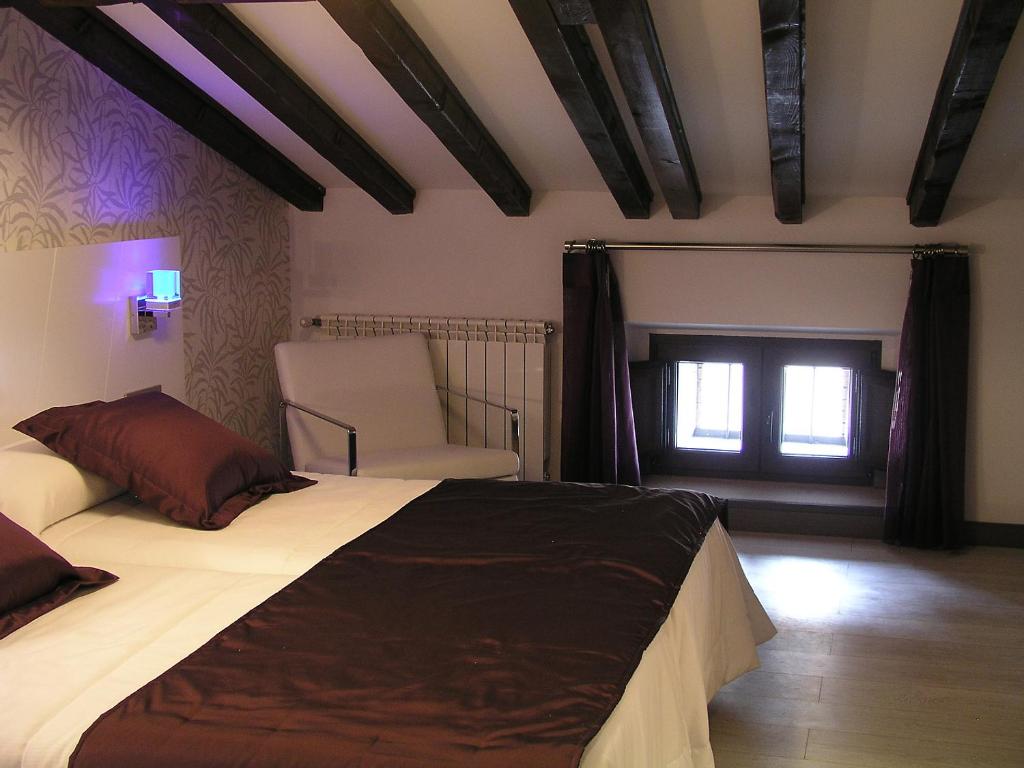 德贝兰加乡村别墅酒店客房内的一张或多张床位