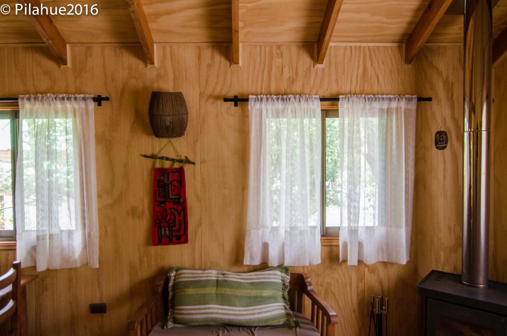 Cabañas Pilahue客房内的一张或多张床位