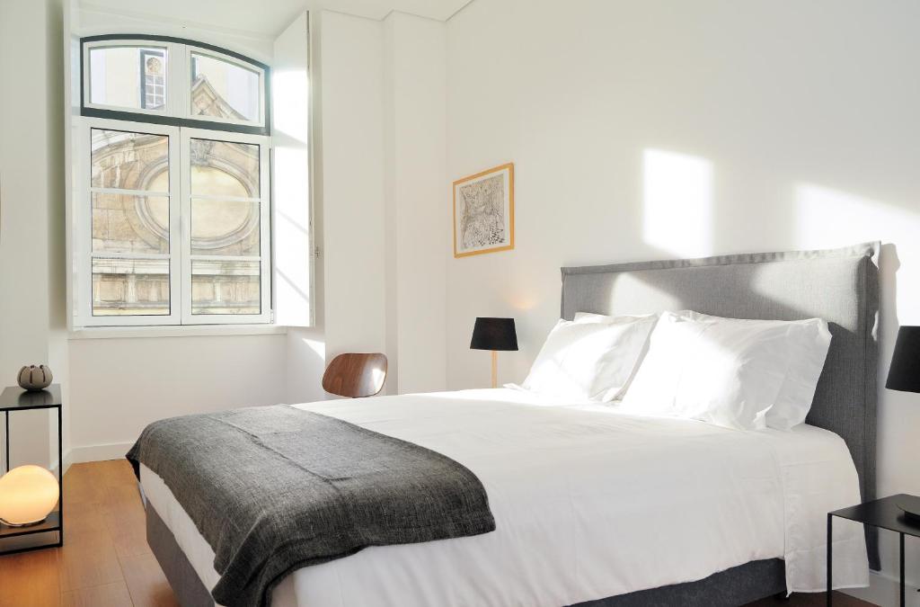 里斯本服务式公寓 - 拜萨堡客房内的一张或多张床位