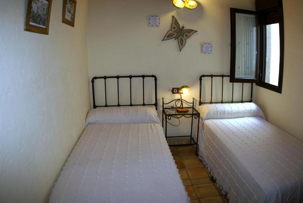 卡索拉阿布拉之家乡村民宿的双床间设有2张单人床。