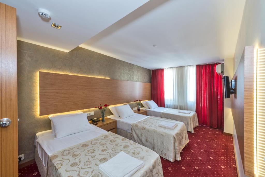 厄尔巴兹拉尔酒店客房内的一张或多张床位