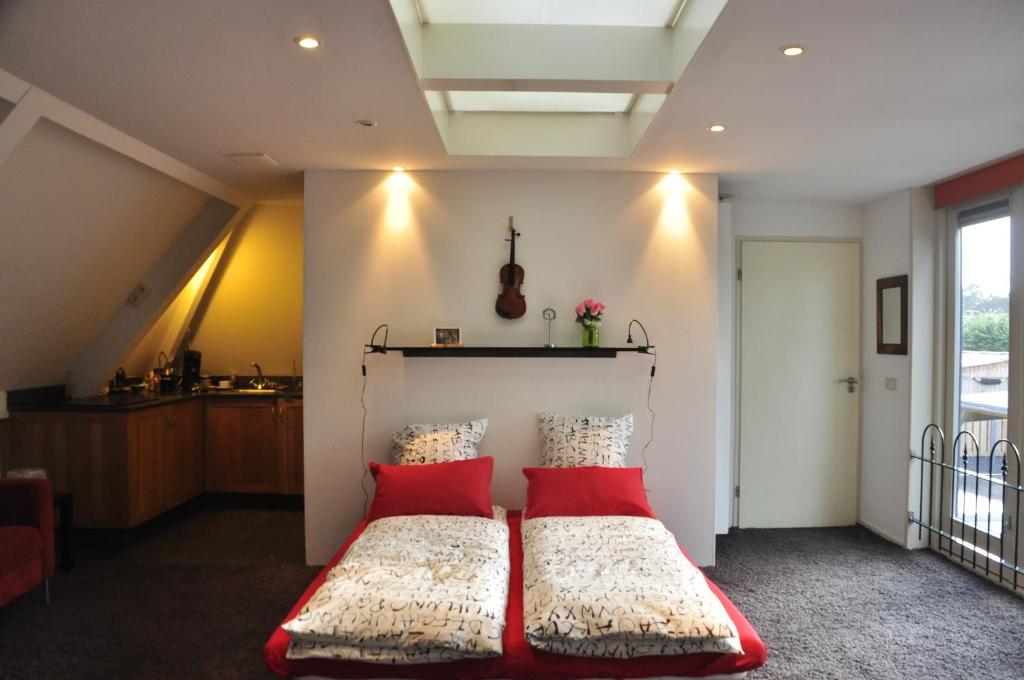 博卡美尔公寓客房内的一张或多张床位