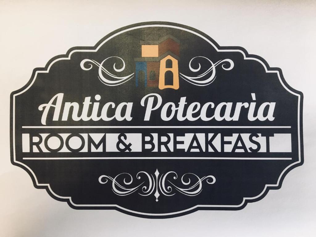 TonaraAntica Potecarìa的一间古罗马式早餐室的标志