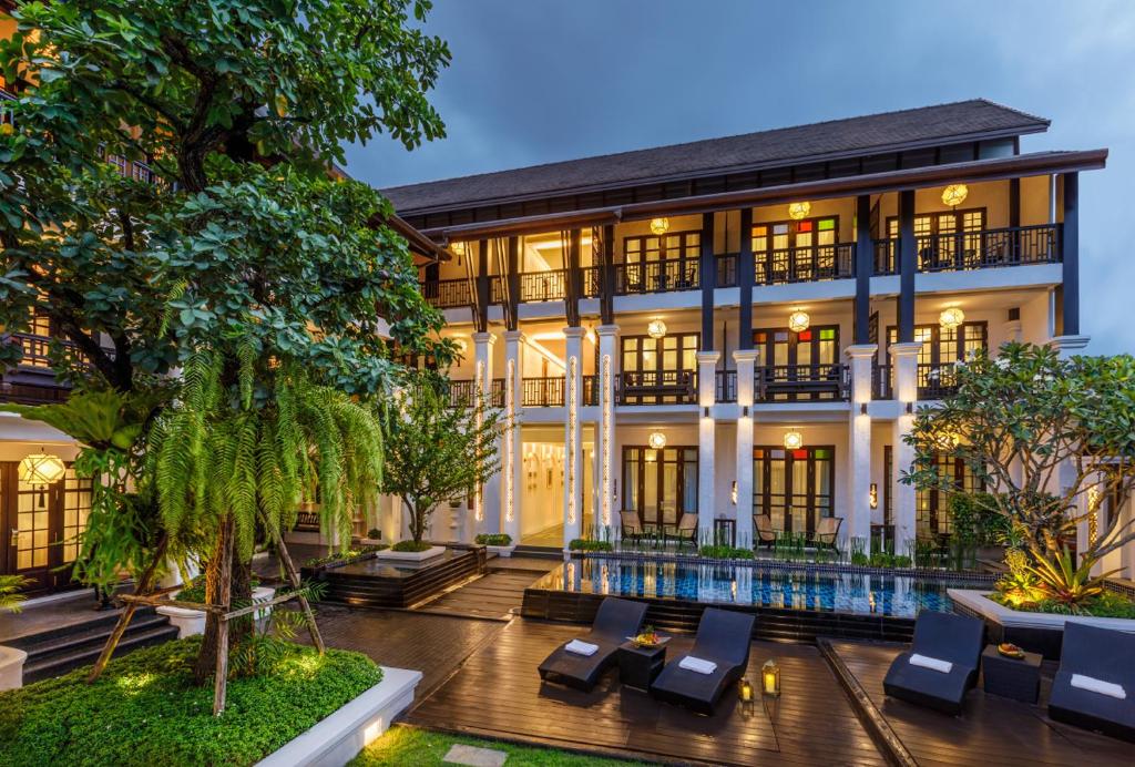 清迈泰阿卡拉-兰纳精品酒店-SHA Extra Plus的享有带游泳池的别墅外景