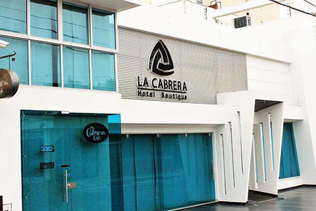 内瓦La Cabrera Hotel Boutique的一座建筑,上面标有读园艺师酒店