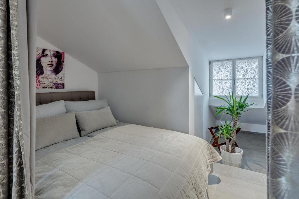 smartroom The Residence la Cittadella Baden客房内的一张或多张床位