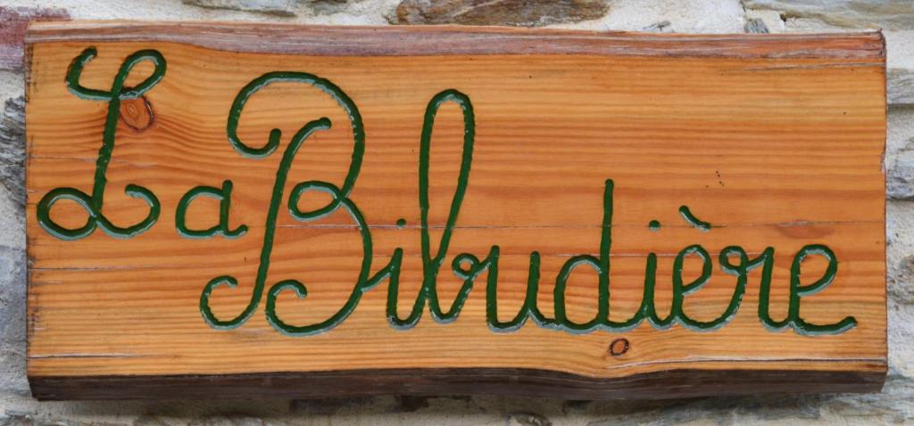 Le BoupèreGîtes de la Bibudière的写在上面的带有好态度的标志