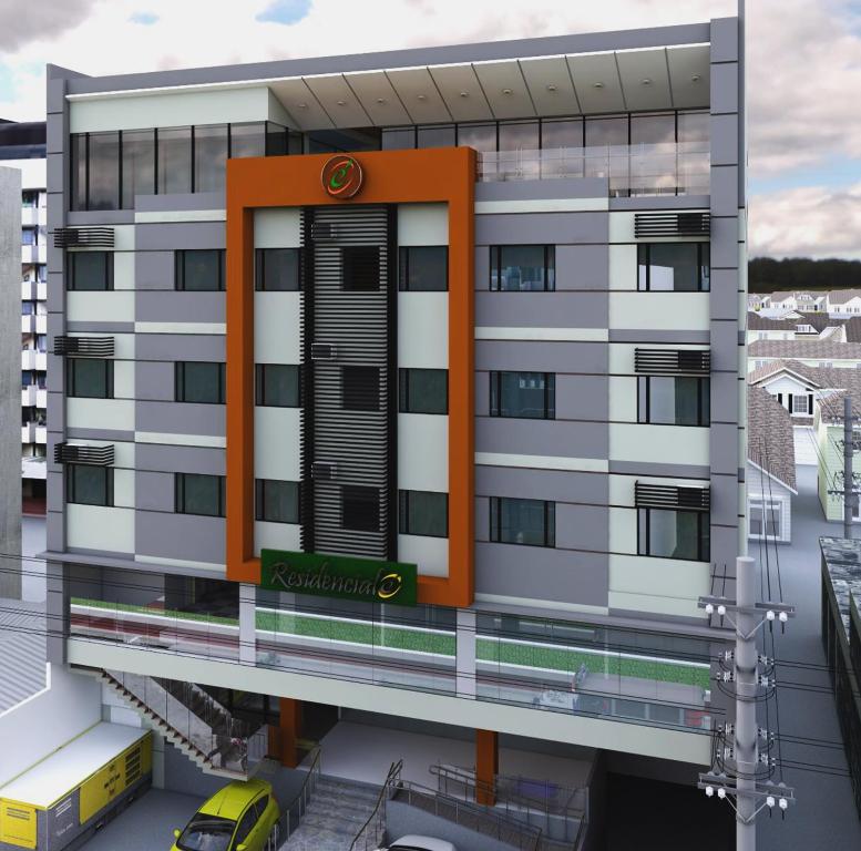 马尼拉莱斯登西亚精品公寓式酒店的橙色门楼外景