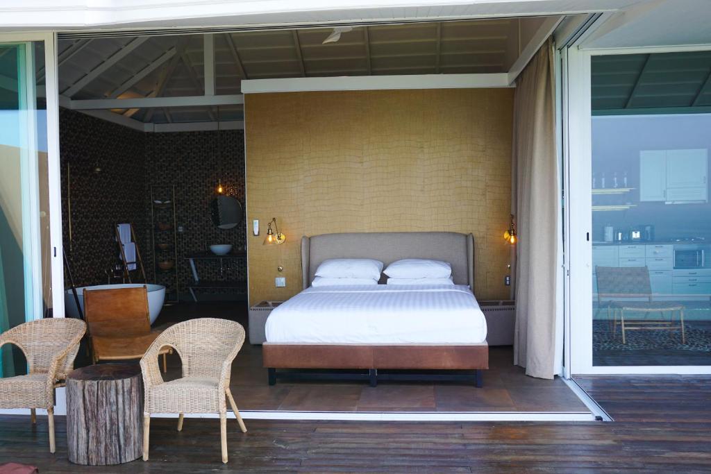 纳鲁阿别墅酒店客房内的一张或多张床位