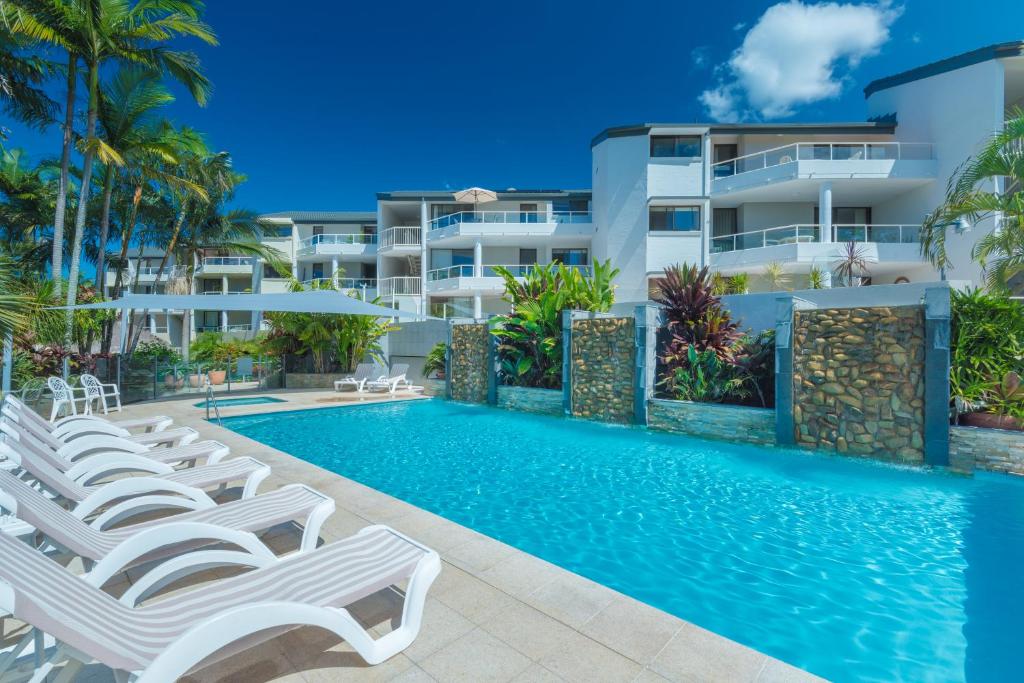 努萨维尔穆尼纳海滩公寓酒店的度假村游泳池的图片