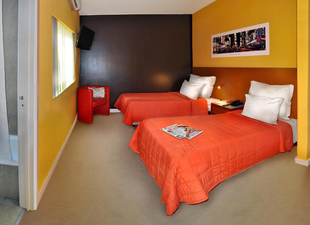 约奥XXI酒店客房内的一张或多张床位