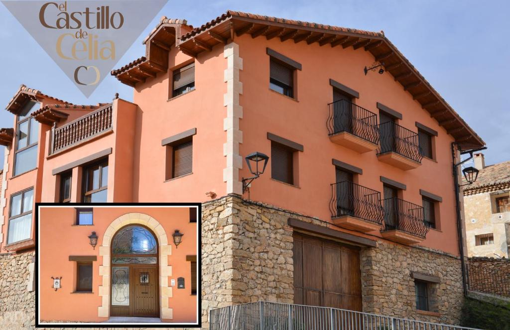 CublaEl Castillo de Celia的一座大型橙色建筑,设有门和阳台