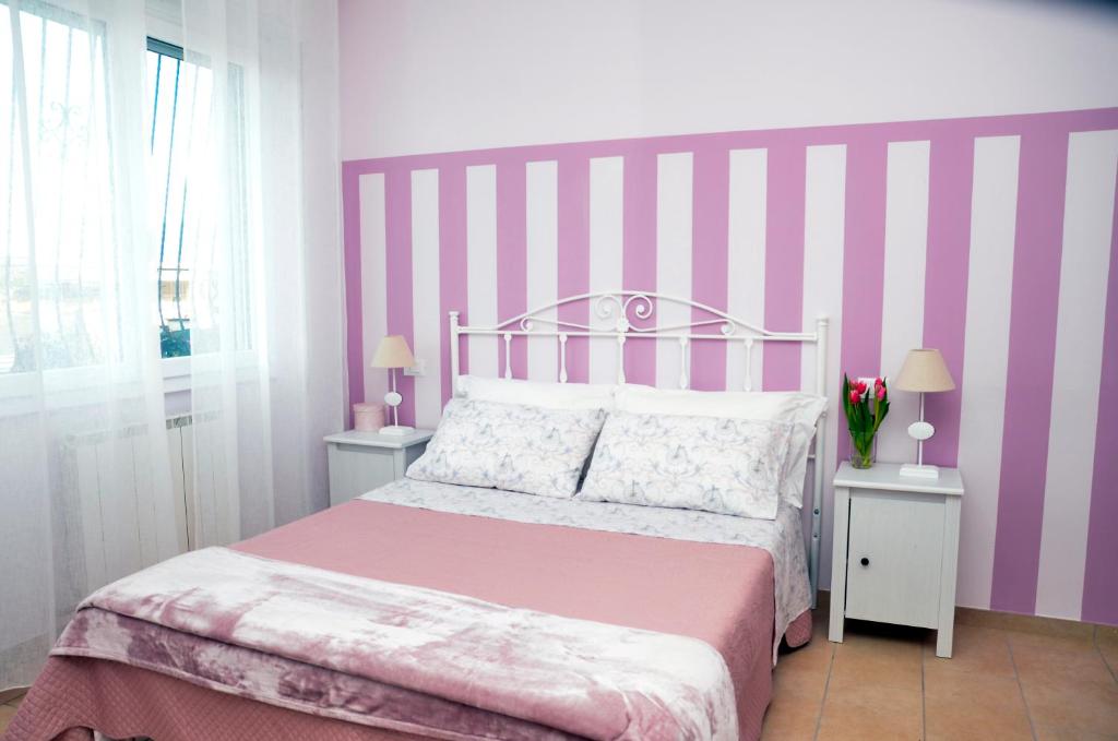 IL CILIEGIO Affittacamere客房内的一张或多张床位