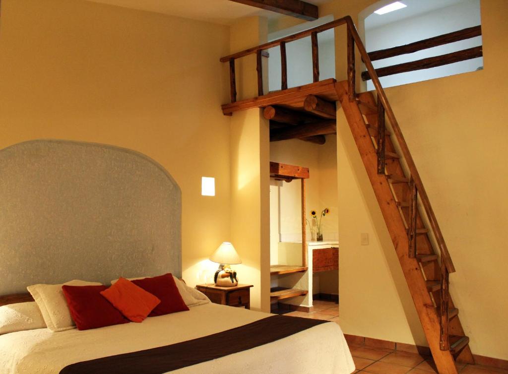 Hotel Posada Real Tapalpa客房内的一张或多张床位