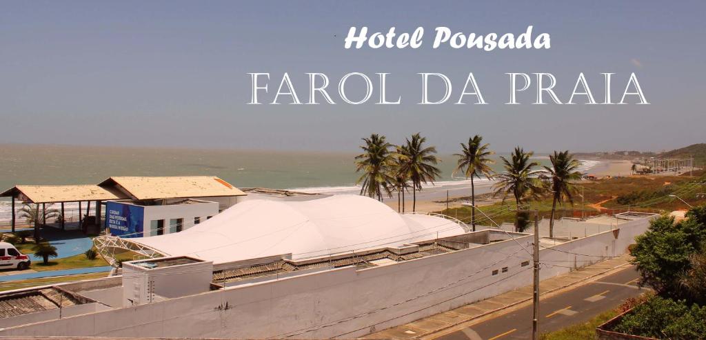 圣路易斯Hotel Pousada Farol da Praia的海滩旁的白色帐篷
