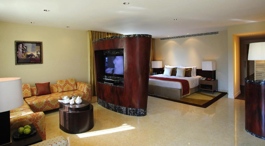 泰姬陵俱乐部大厦酒店客房内的一张或多张床位