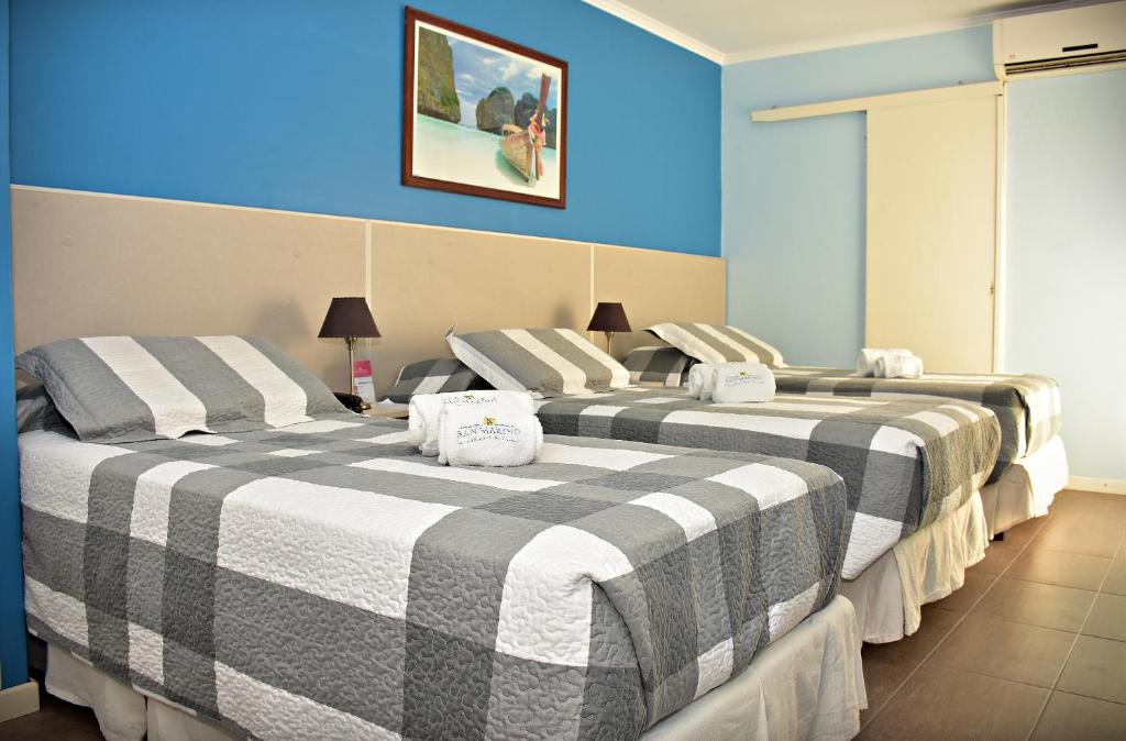 Hotel San Marino客房内的一张或多张床位
