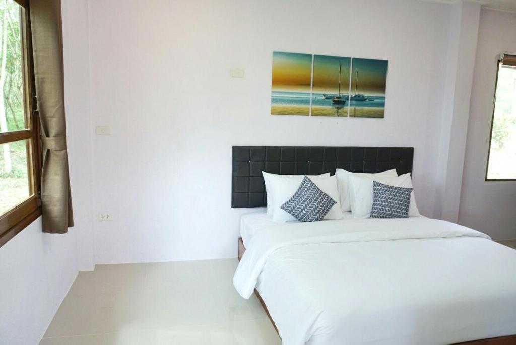 The Lodge at Koh Kood客房内的一张或多张床位