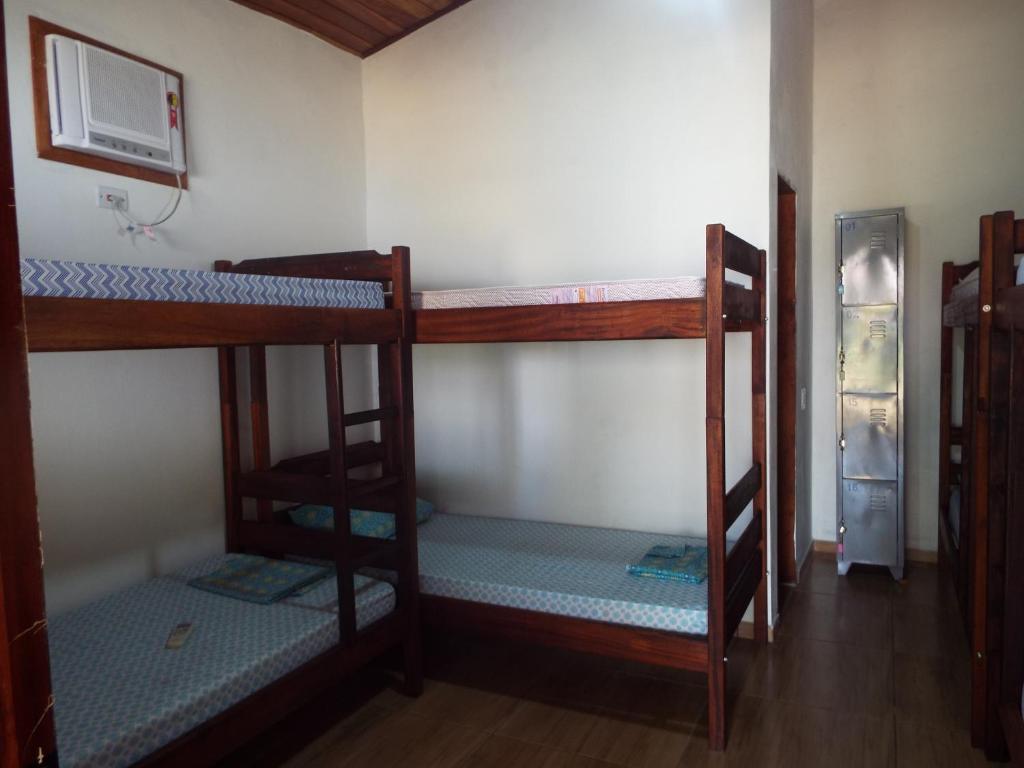 Livina Hostel客房内的一张或多张床位