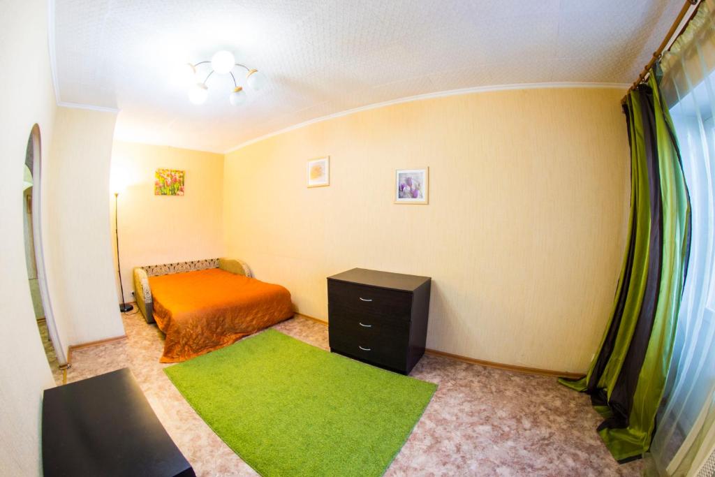 RENT-сервис Apartment On Marksa 31客房内的一张或多张床位