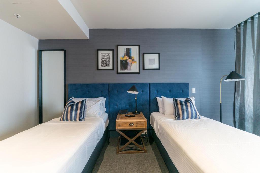 莫斯拜克斯酒店客房内的一张或多张床位