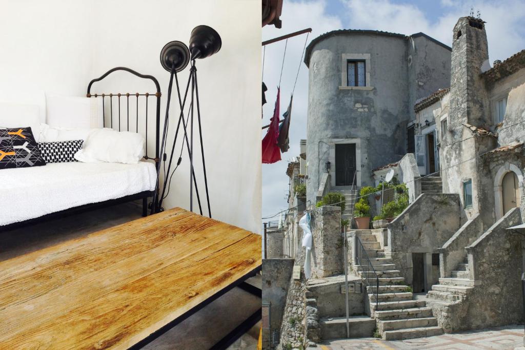 维科德尔加尔加诺Casa Ricciotto的一间卧室配有一张床,并拥有城堡的照片