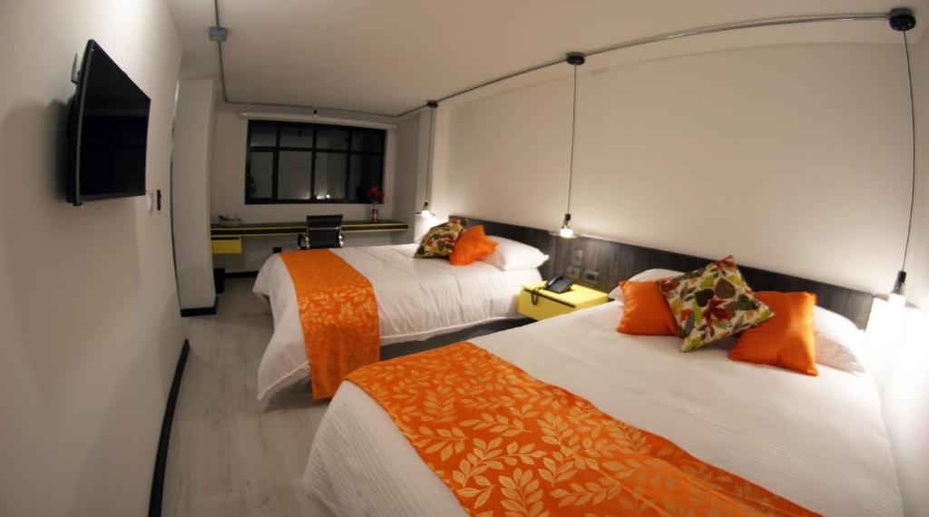 Hotel RDOS客房内的一张或多张床位