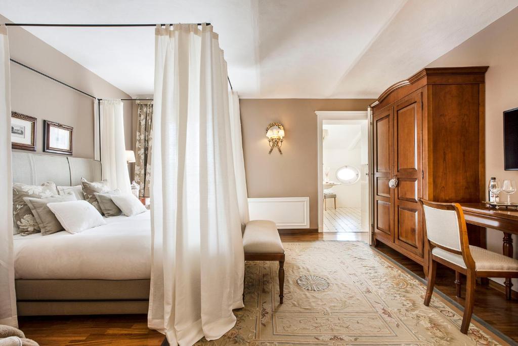 科尔特贡迪亚精品酒店客房内的一张或多张床位