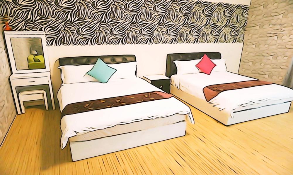 东港东港海湾精品民宿 的卧室的一张图,带两张床