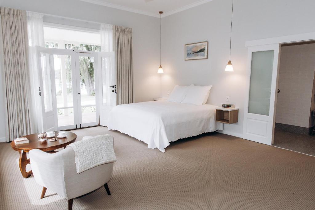 Winniston Lodge Luxury Accommodation客房内的一张或多张床位