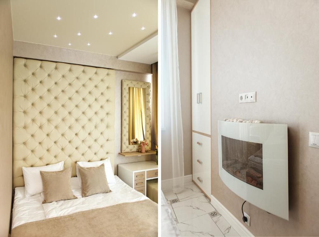 阿德勒Апартаменты на Тюльпанов 3的卧室两张图片,配有一张床和电视