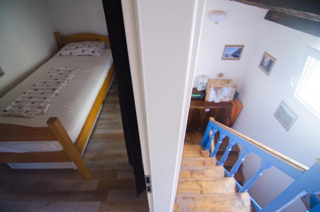 Traditional Piran house客房内的一张或多张床位