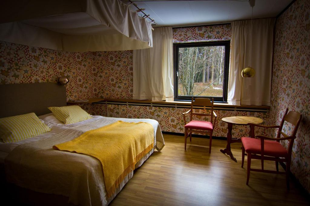 Vallåsens Värdshus STF Hostel客房内的一张或多张床位