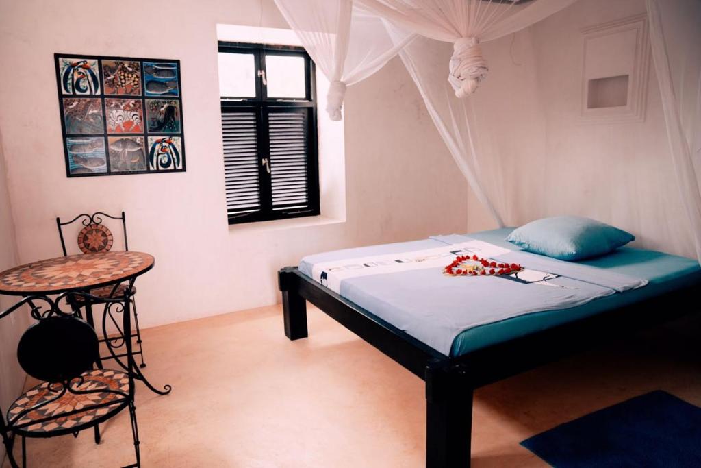 Jamala Guesthouse客房内的一张或多张床位