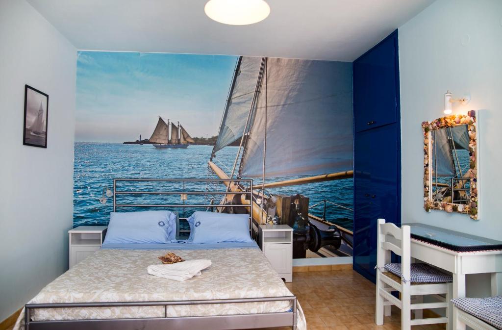 斯派赛斯Anemos的水中带一张床和帆船的房间